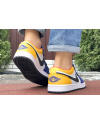 Купить Чоловічі кросівки Nike Air Jordan 1 Retro Low білі з жовтим
