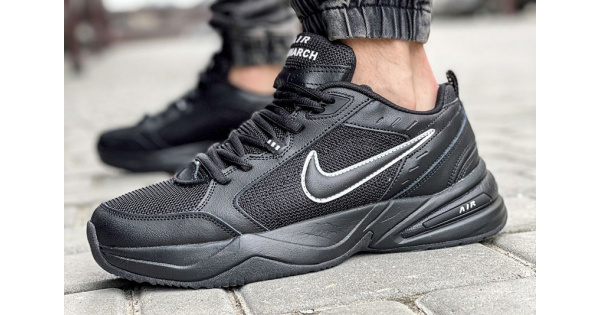 Nike air monarch hotsell iv black on feet